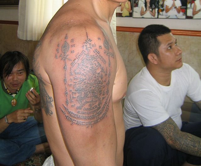 Get tattooed by a holy man,